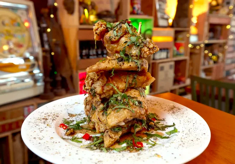 Nue: both their wings and bunny chow for brunch are great